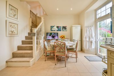 The Muntham Luxury Town House Self Catering Accommodation on The English Riviera - spacious family kitchen with direct access onto  private terrace and garden.