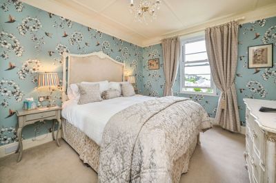 The Muntham Town House Luxury self Catering in Torquay - Main bedroom with king sized bed.